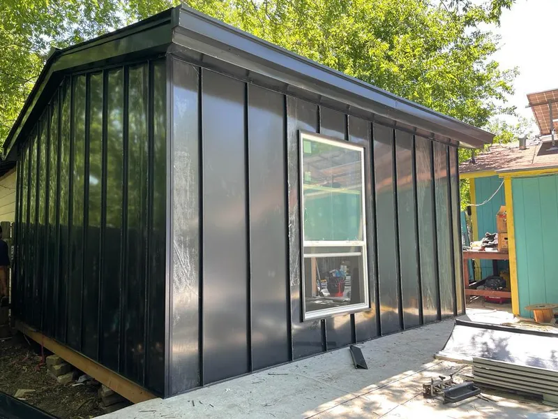 Black standing seam metal wall panels for Metal Roof Installation in Painesville